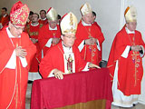 Five bishops pray before reliques of St. Anastasia